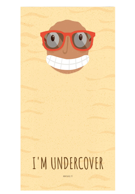 beach towel with a cartoon character wearing red sunglasses and the text 'I'm Undercover' to customise text 